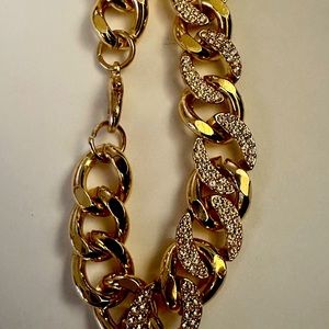 gold-tone or silver-tone bracelet with crystal accents; length: 203mm